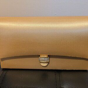 Versatile gold clutch bag for formal and party events!